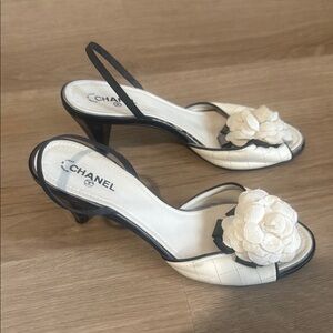 CHANEL Black and Cream Heels with Floral Accent